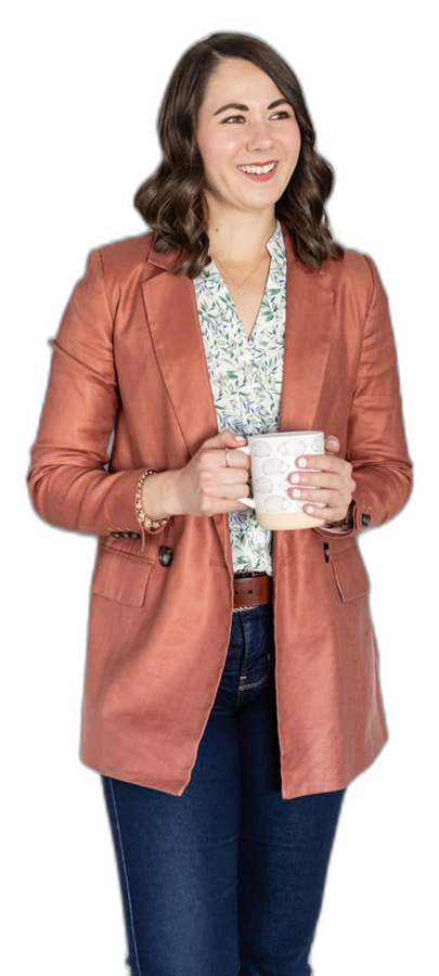 Brittany Miller, LinkedIn Business Growth Academy coach, holding coffee